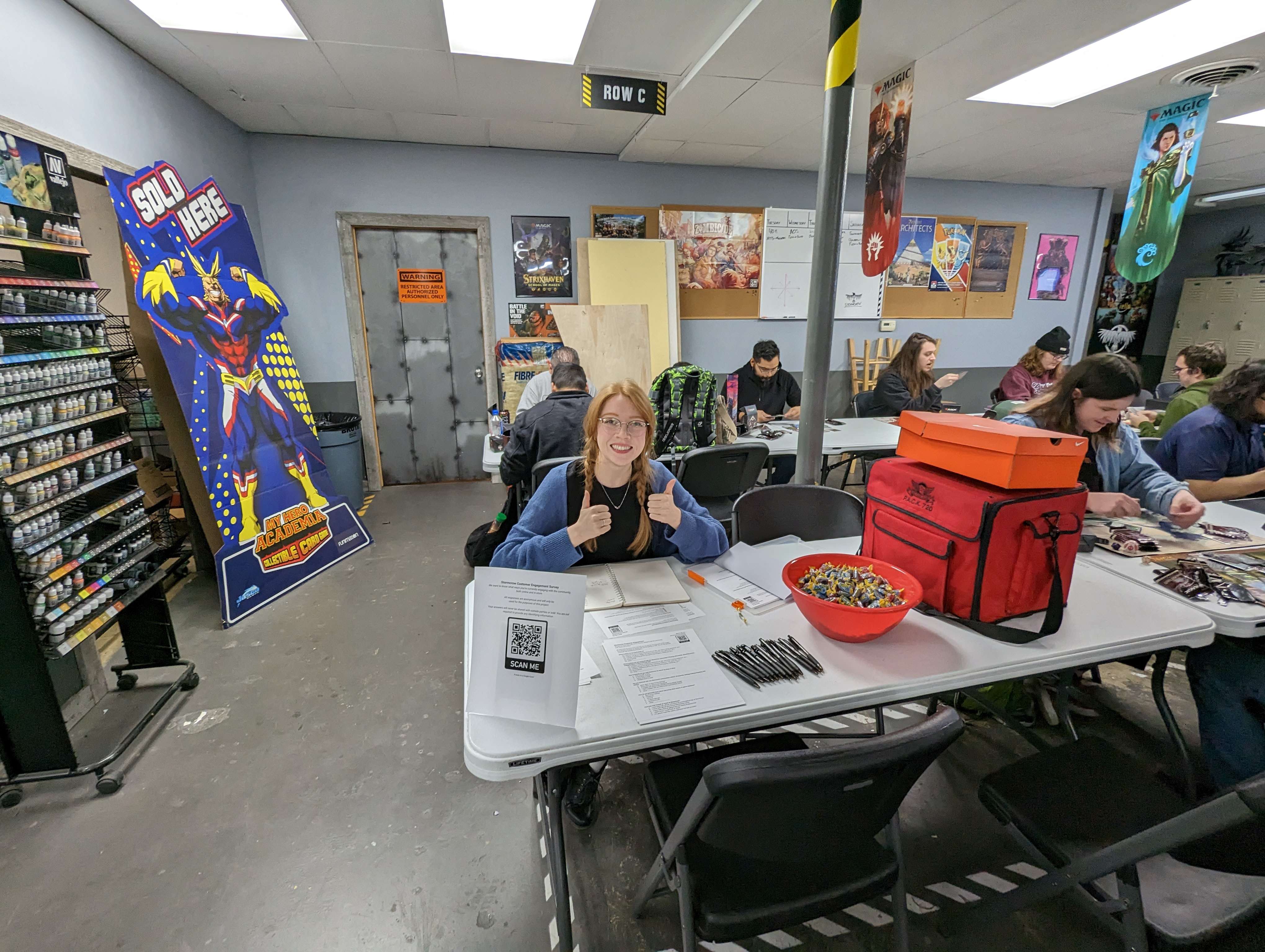 Madi Gilbert conducting research during a project at a local game store.